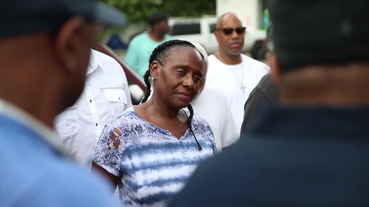 Scenes from the prayer vigil for Shell station employee who was fatally shot