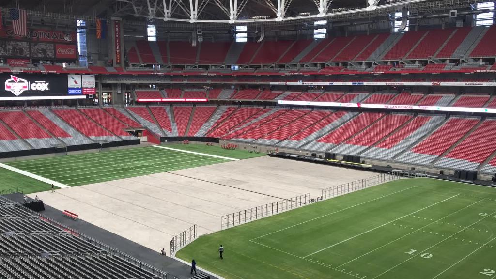 Grass field rolls in at University of Phoenix Stadium