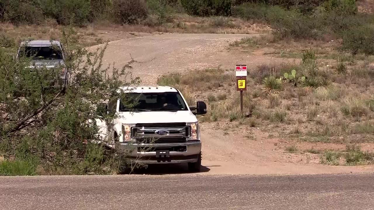 Outside the roadblock to Sen. John McCain's Cornville, Arizona, home