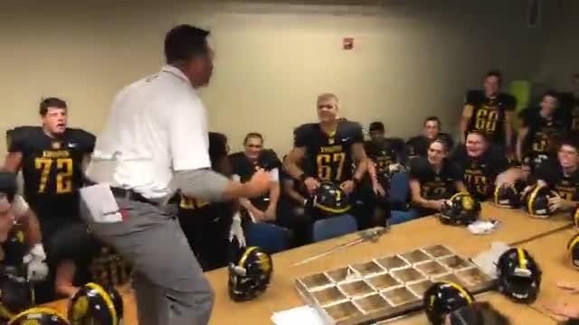 Bobby Bates, McQuaid coach, jumps on table as he fires up team
