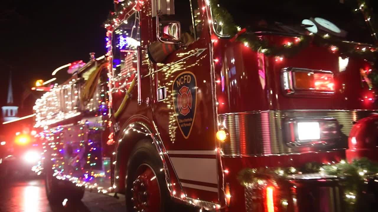 Northville lights up snowy downtown streets with holiday parade