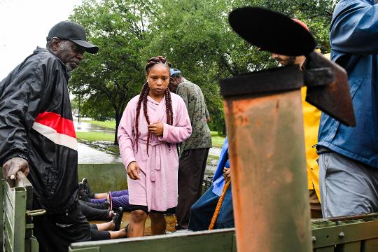 Guy with plunger 2025 during hurriance harvey