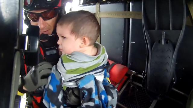 Children, pets rescued from floods: See it first hand