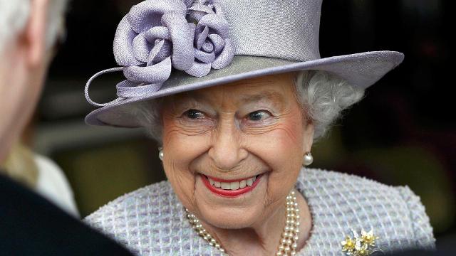 Fan of Queen Elizabeth with decorated fingernails with the British flag and  a hair clip with the Union Jack ready for the Platinum Jubilee celebration  Stock Photo - Alamy