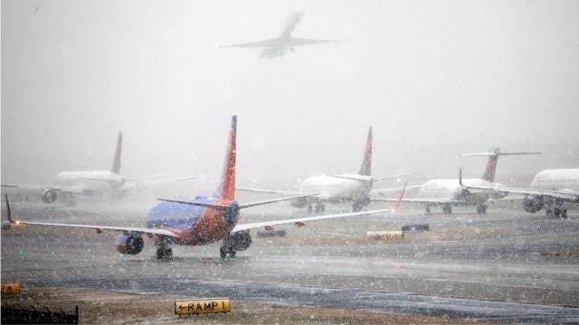 Hundreds of flights delayed canceled because of Atlanta snow