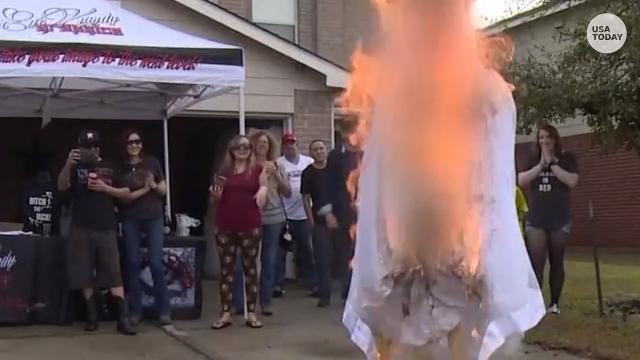 Texas woman burns her wedding dress at post divorce garage sale