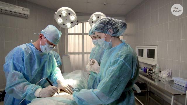 Image result for a doctor removes healthy kidney in surgery