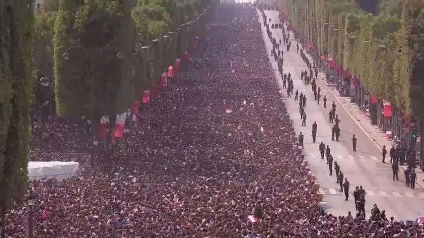 Massive Crowds Fill Paris To Welcome World Cup Champs