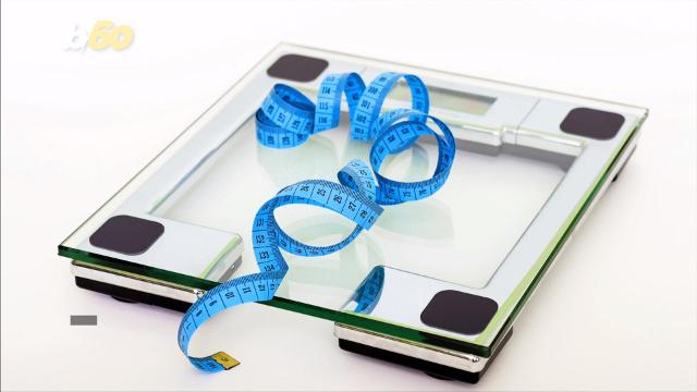 Text lose weight with weigh scale and measure tape