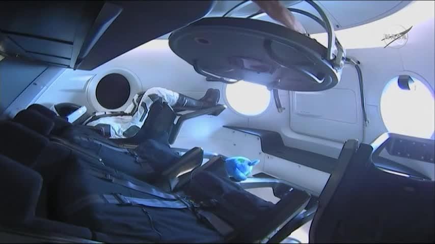 Hatch opened after SpaceX capsule docks at ISS