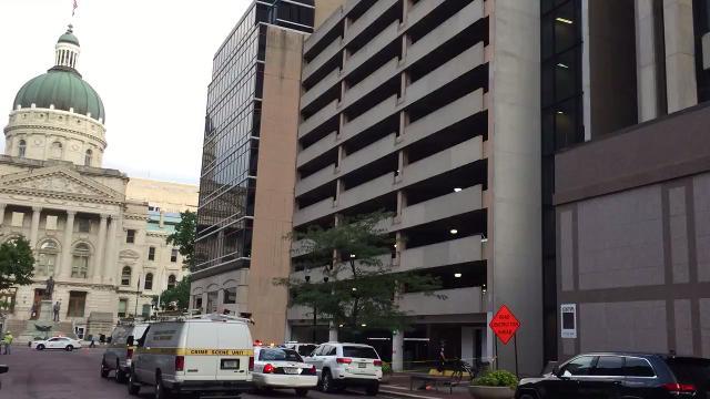 man jumps from parking garage