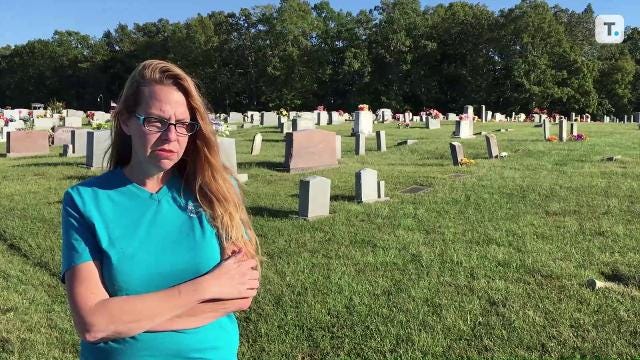 Woman encounters sex in the cemetery