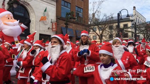 Hundreds Of Santas Race Through Burlington For Charity