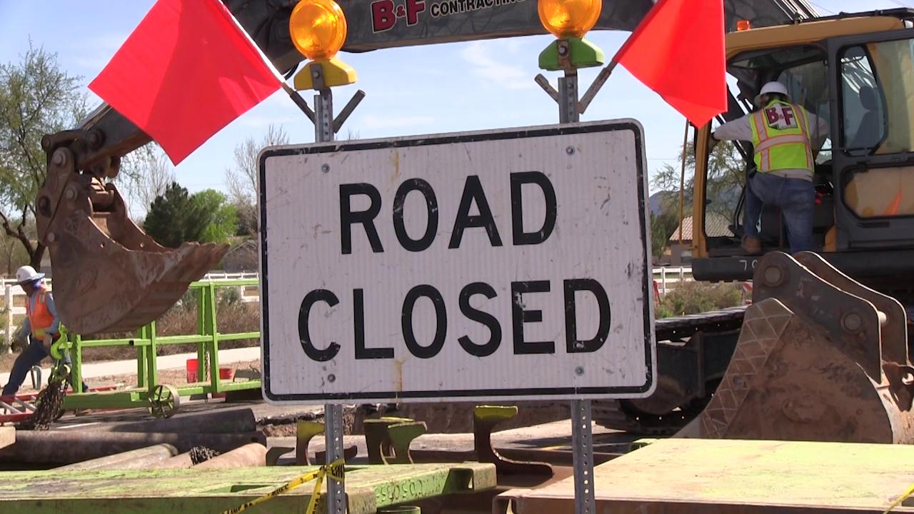 Raw road construction crews start the repair work on a sinkhole in Gilbert Arizona