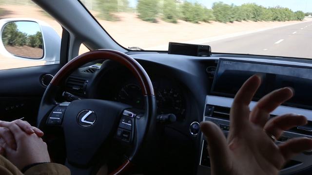 Google's self-driving cars learn how to drive at a Mesa intersection