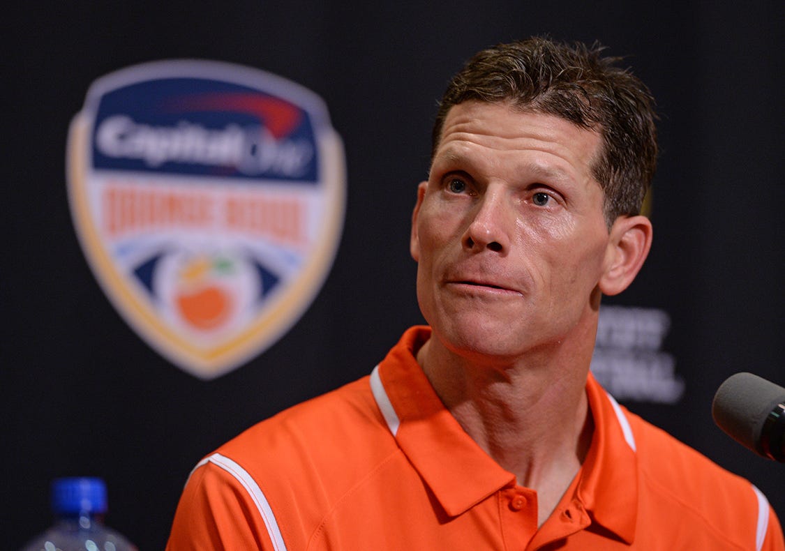 Brent Venables talks with the media in Miami