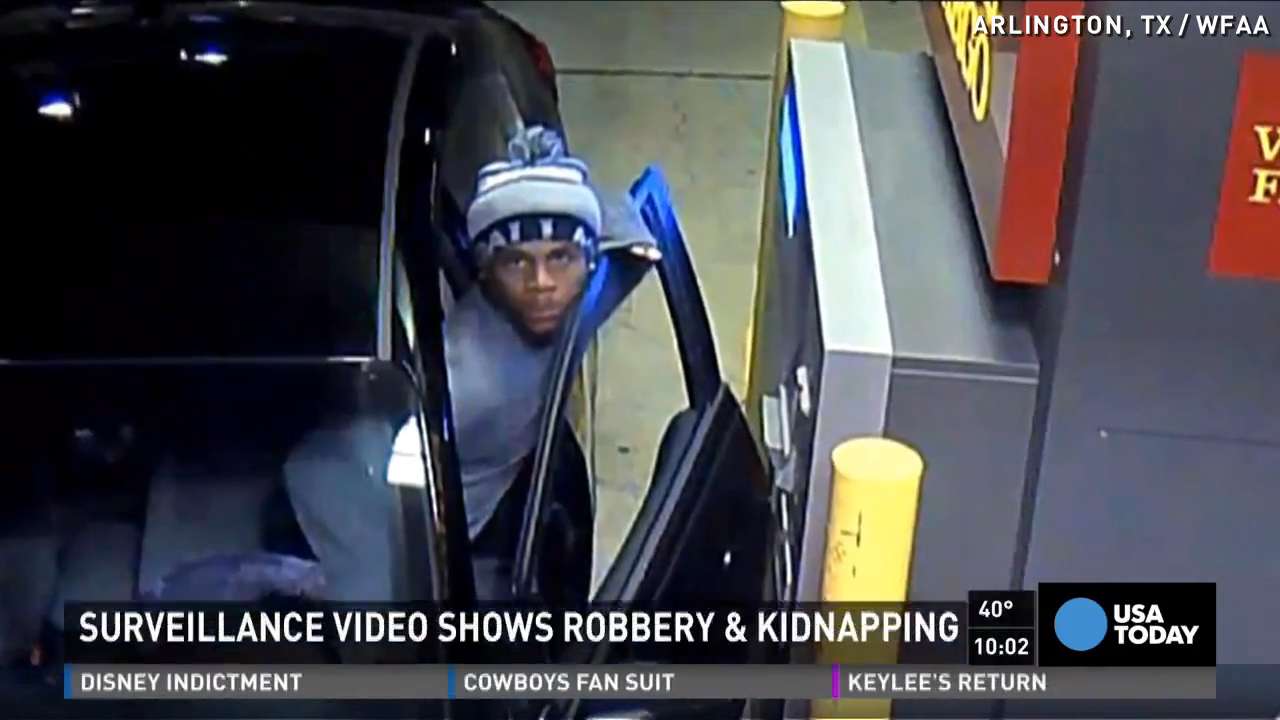 Caught on camera Woman forced into trunk at gunpoint