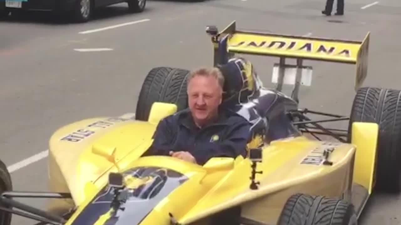 Larry Bird driving an Indy car