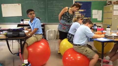 Flaget Swaps Chairs For Exercise Balls