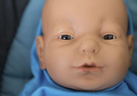 Robot baby doll sales simulator